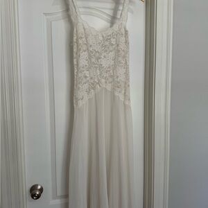 Elegant White Lace Dress sheer top and silk bows on the back midi length